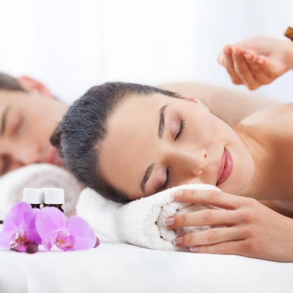 Couple having a spa treatment Couple having a spa treatment